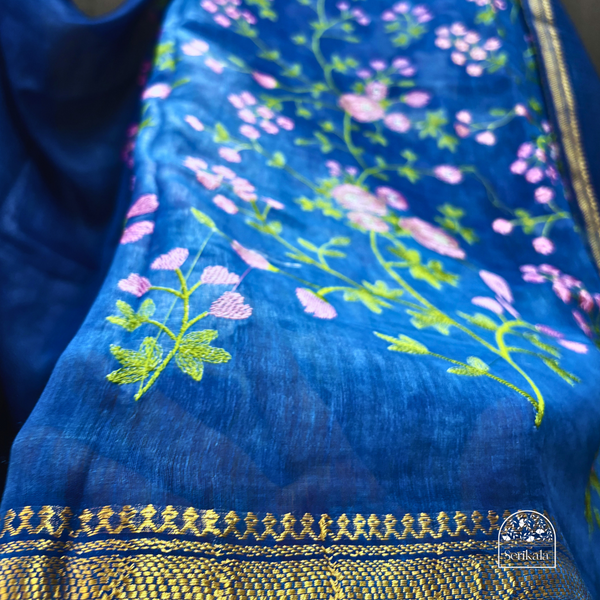 Exquisite Royal Blue Linen Saree with Pink Floral Embroidery
