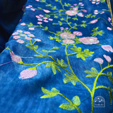 Exquisite Royal Blue Linen Saree with Pink Floral Embroidery